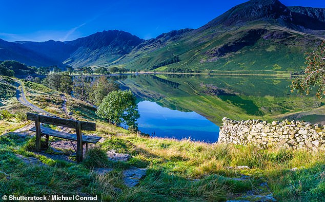 This image shows Buttermere in the Lake District. Swift mentions that she went for a swim in a cliff-top pool near this tranquil spot in her 2020 song The Lakes