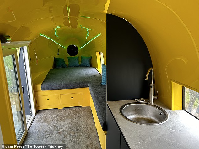 A stay in the Royal Navy helicopter costs from £130 per night. The picture above shows the double bed and kitchen.