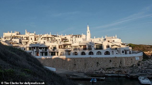 The image shows the town of Binibeca Vell, known as the 