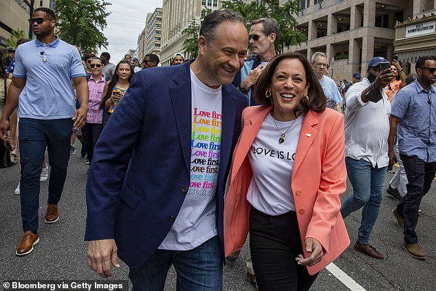 Vice President Kamala Harris, center right, and Second Gentleman Doug Emhoff, center left, attend the Gay Pride March and Parade on Capitol Hill in Washington, DC.