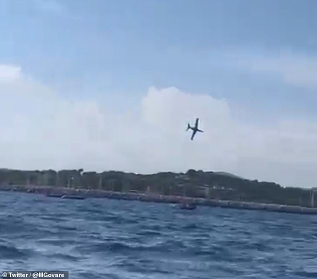 A shocking video shared on social media appears to show the aircraft crashing into the sea amidst several vessels, which barely manage to be hit.