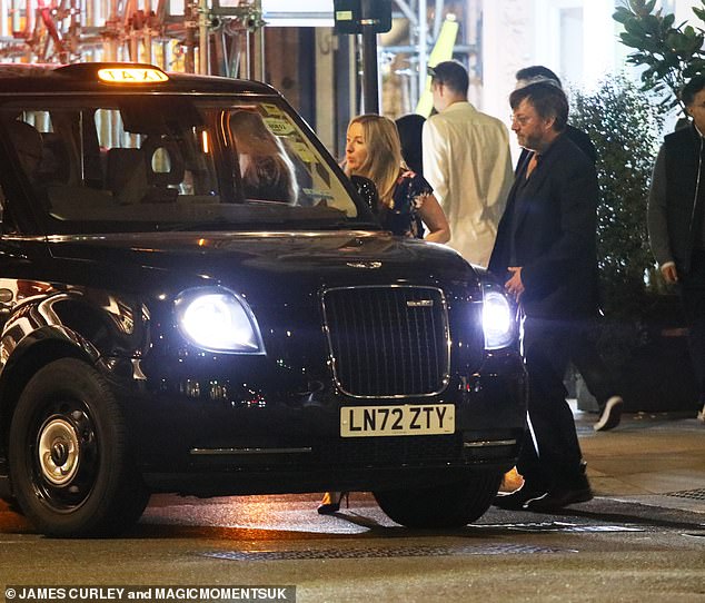 The couple were then seen getting into a black cab to head home after the rare night out together.