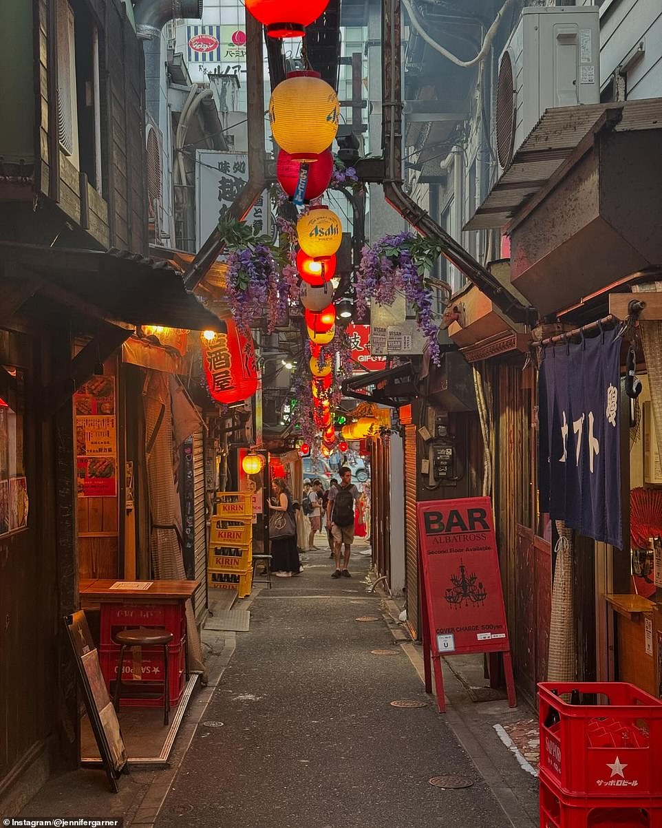 The last slide showed a city alley dotted with lanterns and Asahi boxes near the Albatross Bar.