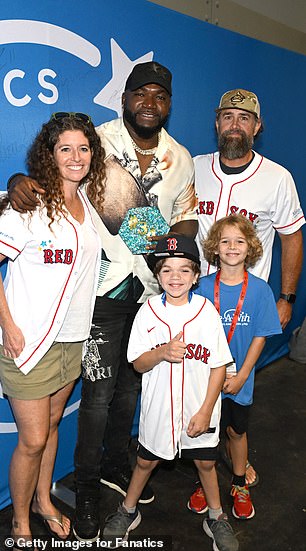 Ortiz with the family of a Make-A-Wish child