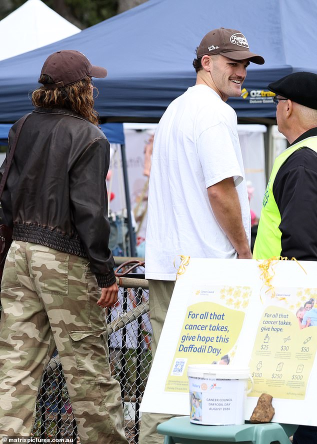 The Panthers midfielder couldn't stop smiling as he strolled through the markets with Fowler.