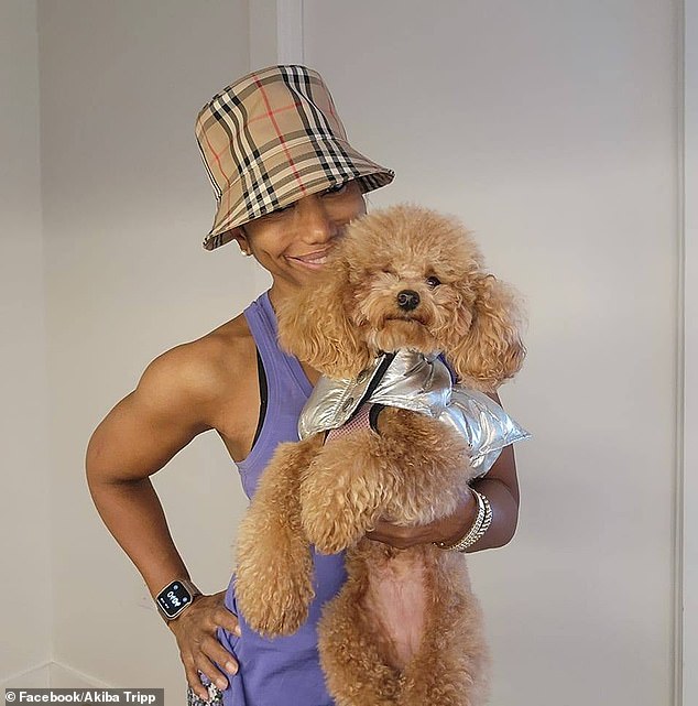 Personal trainer Akiba Tripp with her seven-pound toy poodle Baby, who was killed by Syko near the bookstore when the owner suddenly opened the door.