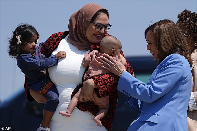 Kamala Harris greets Durham County Commissioner upon her arrival in Raleigh for her economic address on August 16, 2024