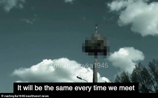 The sickening video, shared by a Russian Telegram account, purportedly shows a severed head impaled on a pole.