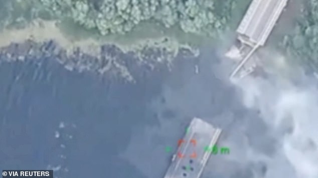 Images show the bridge completely destroyed after the alleged HIMARS attack