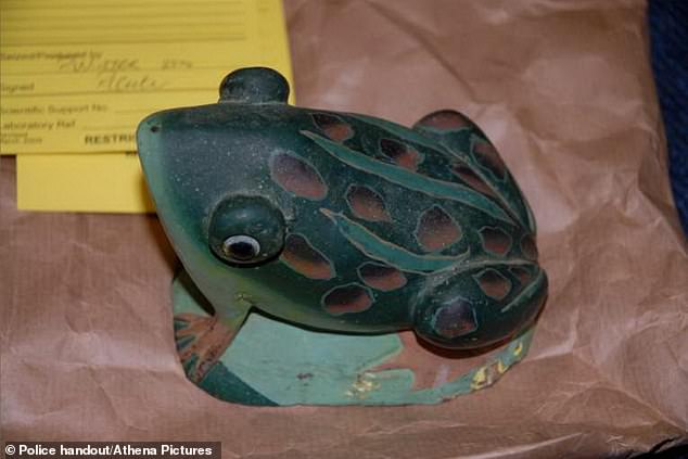 South Wales Police believe mother-of-five Leigh crushed her head with a blunt instrument, believed to be an ornamental frog (above), and then hid her body for years in her two-bedroom council flat in the village of Beddau.