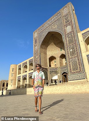 Luca next to the Poikalyan Madrasa in Bukhara, Uzbekistan, which he says is a country 