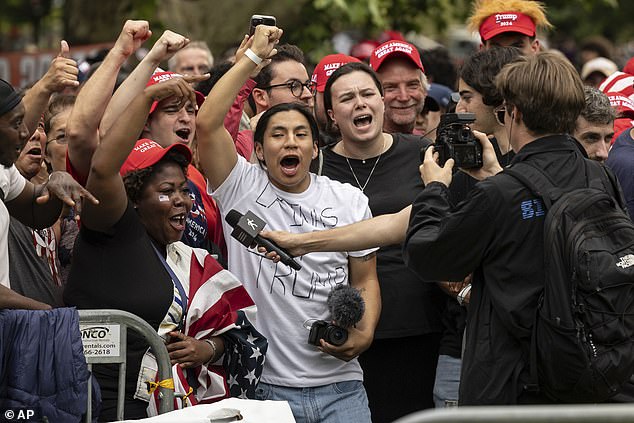 Trump supporters gather before a campaign rally in the Bronx borough of New York in May of this year.