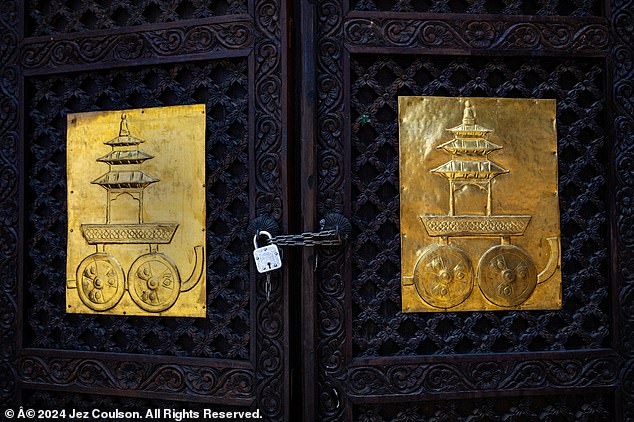 Tourists have the opportunity to see the Kumari in Kathmandu's Basantapur Durbar Square, but after she appears, we are escorted out of the palace square and the gates are closed behind us with a chain.