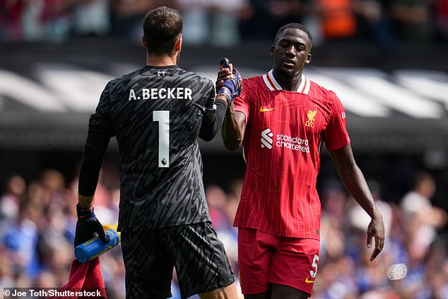 Ibrahima Konate (right, pictured with Alisson) came on as a centre-back at half-time.