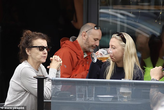 At one point, Millie took a sip of her pint as she tried to enjoy her afternoon out.