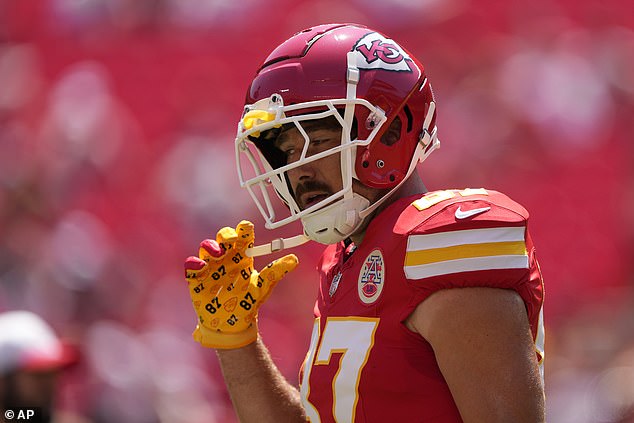 TIME TO DO BUSINESS: Kelce then donned his red No. 87 jersey and his signature Chiefs gloves.