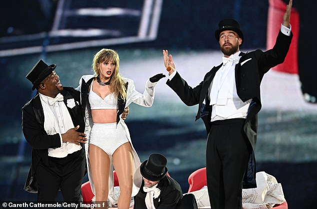 Looking ahead, they concluded that Monday's show, which featured a top hat symbol, would see Taylor's boyfriend Travis Kelcee (right) return to Wembley (pictured on stage in June).