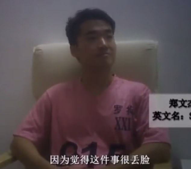 A video released by Chinese police shows a man wearing a pink T-shirt admitting to breaking Chinese law. Police said the man was Simon Cheng and that he was making confessions to an officer.