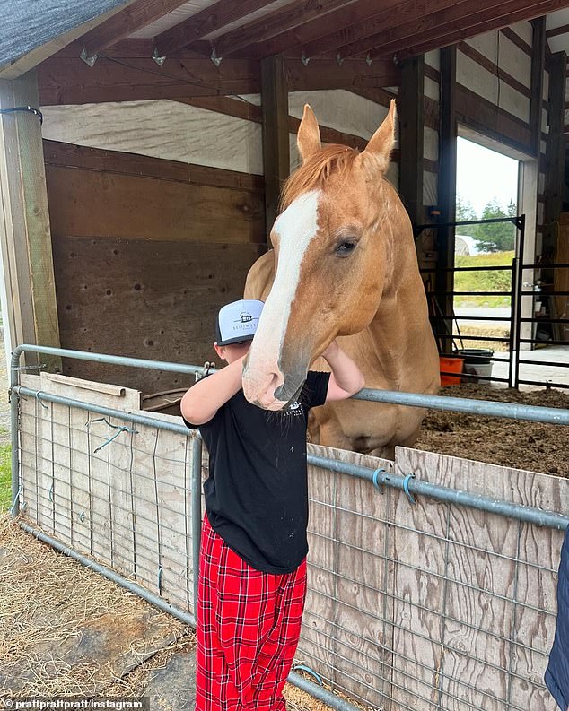 The Parks and Recreation alum also shared a photo of Jack petting a horse.