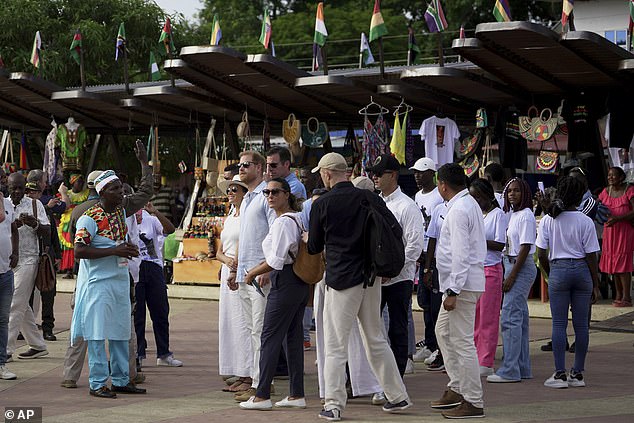 Crowds formed around Harry and Meghan as they arrived in the area on the third day of their visit.