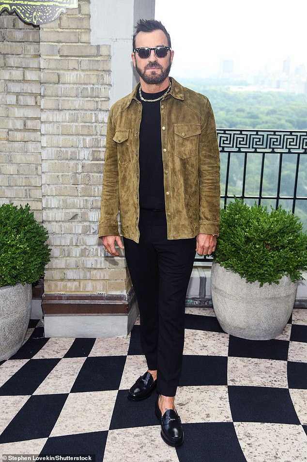 Justin Theroux, 53, wore black like his co-stars, adding a pop of color with a tan suede jacket.