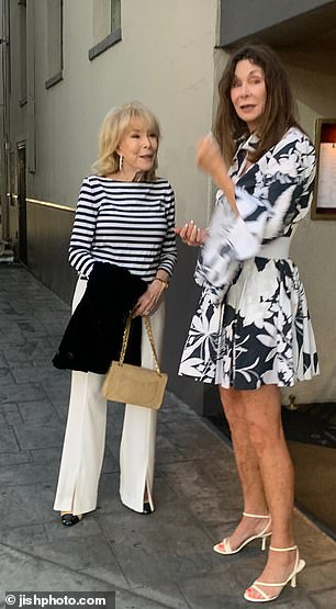 Barbara Eden chats with a friend as she leaves The Grill On The Alley in Beverly Hills on Sunday night.