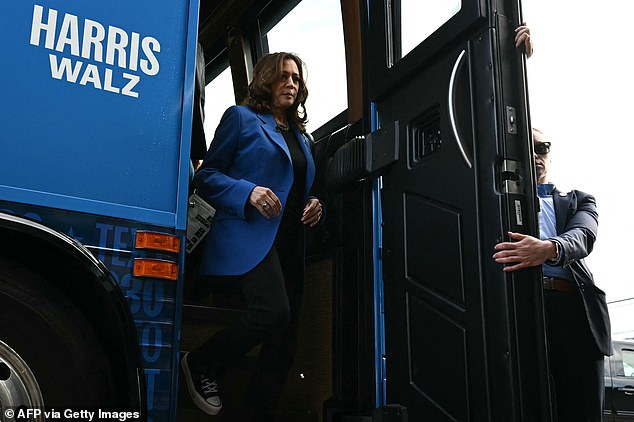 Harris gets off the bus during her tour of the key state of Pennsylvania