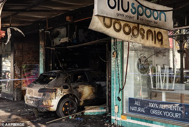 Several Melbourne locations were set alight in the early hours of Monday morning, including a Port Melbourne hair salon (pictured).