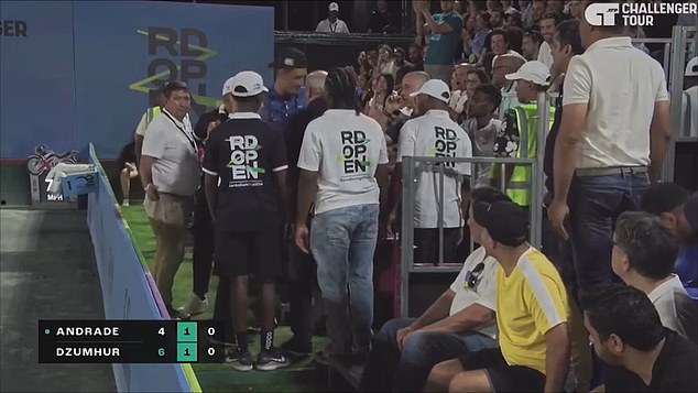 The crowd erupted when Tomic (wearing a cap and blue shirt) was ejected from the ATP Challenger final in the Dominican Republic.