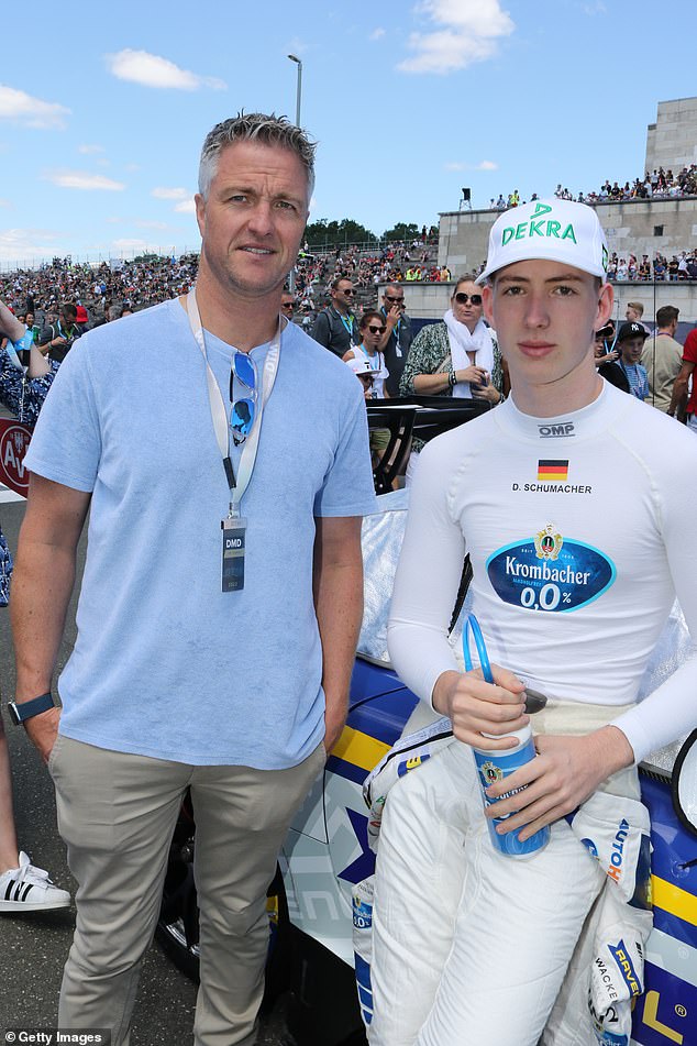 His son David Schumacher, right, also a racing driver, expressed support for his father when he came out as gay.