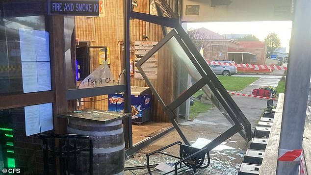 The blast was so powerful that it shattered the front window of KI Fish and Chips on Kangaroo Island and ripped the front door off its hinges (pictured)