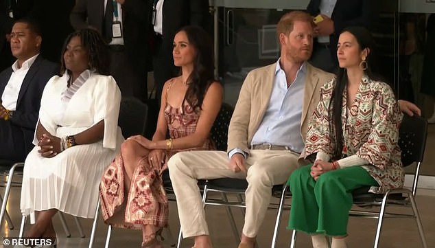 The Duke of Sussex, 39, appeared distracted as he rested his arm on his translator's chair during the performance at the Delia Zapata National Arts Centre.