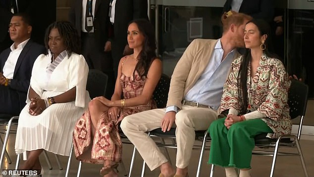 At one point during the performance, Prince Harry turned to someone off-screen to speak to them.