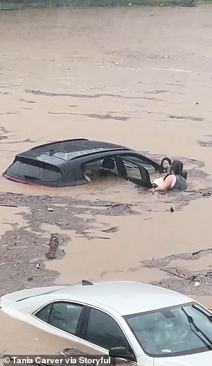 In Connecticut, a man rescued an amputee motorist and his dog from a vehicle stuck in water.