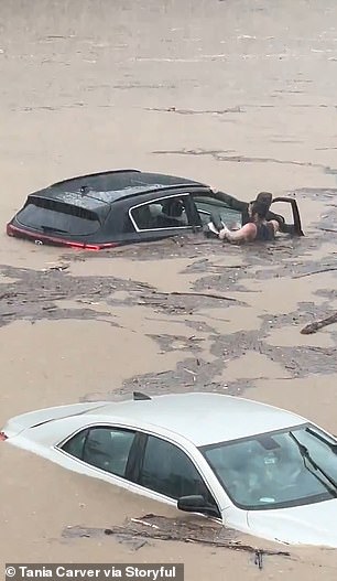 In Connecticut, a man rescued an amputee motorist and his dog from a vehicle stuck in water.