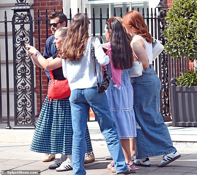 As always, gentleman Harry stopped to take selfies with the group of girls before continuing on his stroll.