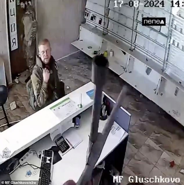 Eventually, one of the fighters notices the security camera and proceeds to smash it.