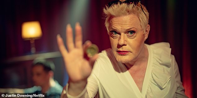 Also seen for the first time was Suzy Eddie Izzard, 62, who cut a glamorous figure in a low-cut white dress in a scene where she appeared to be judging a talent show.