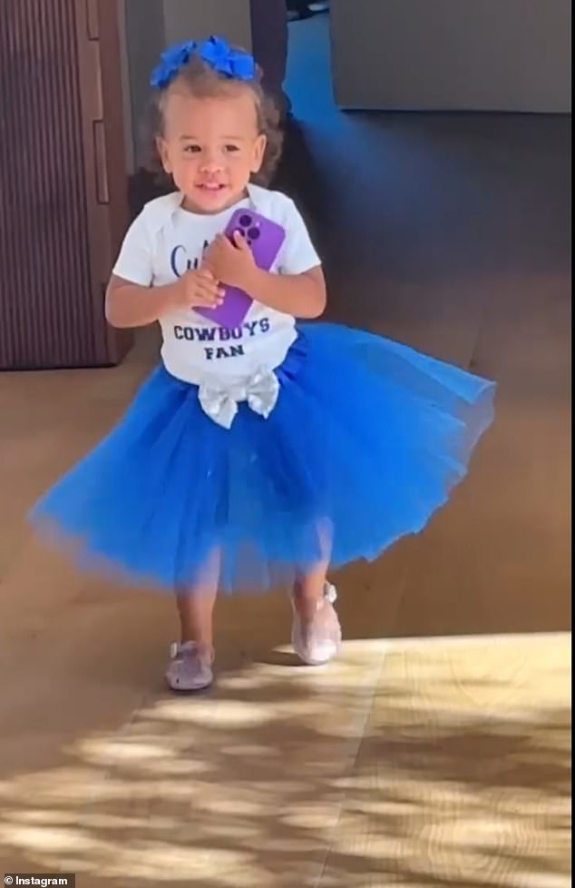 While Chrissy and Luna are putting on makeup, Esti walks into the room wearing a blue tutu and a white t-shirt that says 