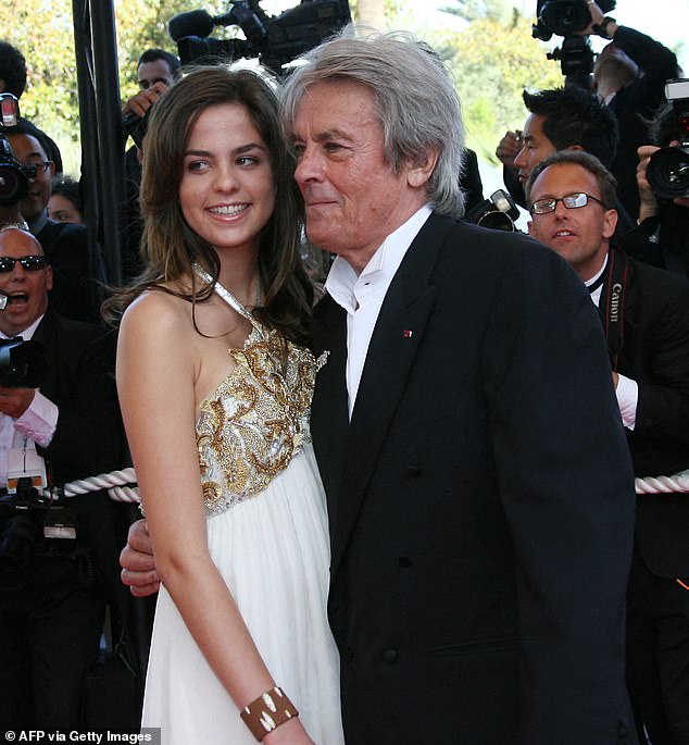 French actor Alain Delon and his daughter Anouchka pose upon arrival at the Palais des Festivals in Cannes, southern France, on May 24, 2007 for the closing ceremony of the 60th Cannes Film Festival.