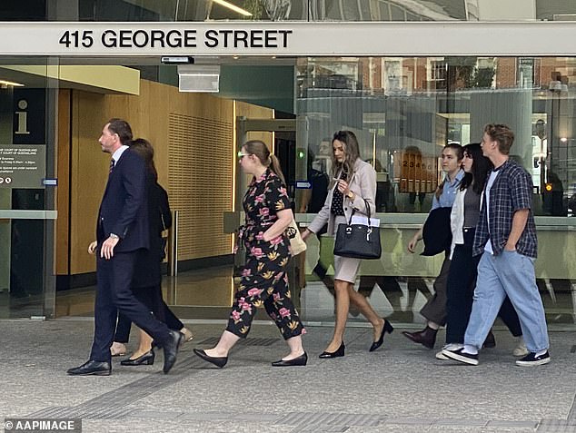 Dr Dunne's family (pictured leaving court) said they had been suffering in limbo for five years waiting for Hill's verdict to be known.