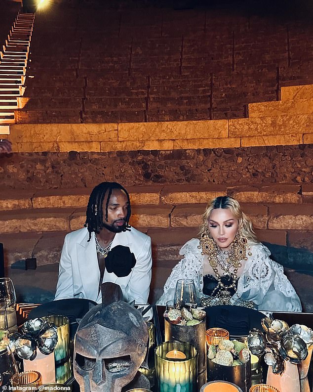 Fans were treated to a glimpse of Madonna's lavish celebrations, where the Material Girl singer enjoyed a lavish banquet with a seat next to her boyfriend.