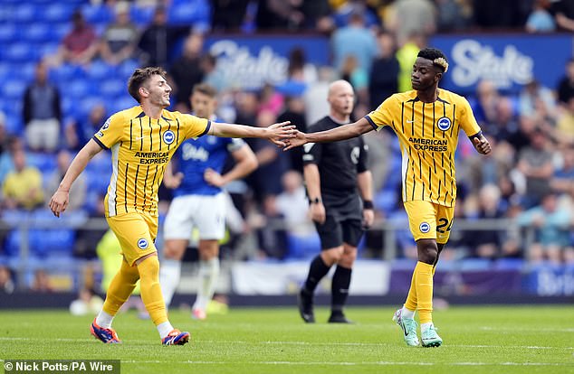 BrightonGilmour celebrates with Adingra after the Brighton striker scored against Everton