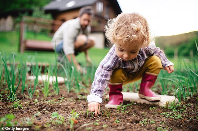 Other suggestions for students ages three to eleven include playing with shadows, digging in the dirt, baking bread, recycling, and playing musical instruments (stock image)