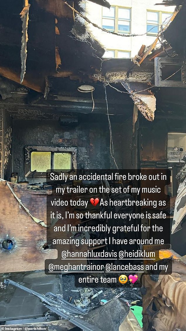 Hilton's trailer caught fire on the set of her upcoming music video, she said Friday.