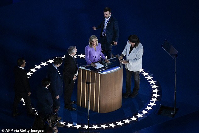 Jill Biden takes a look at the scene ahead of her Monday speech