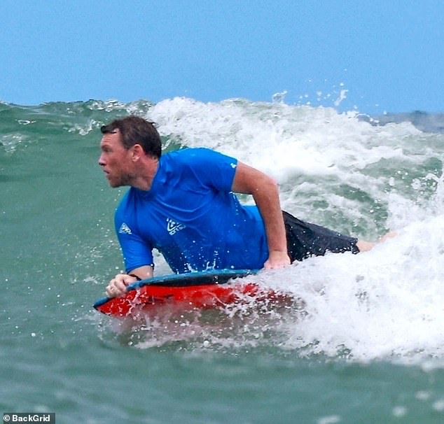 Meanwhile, Avatar star Sam, who shares three children with the model, looked like a pro as he made his way through the water dressed in a blue shirt and black shorts.