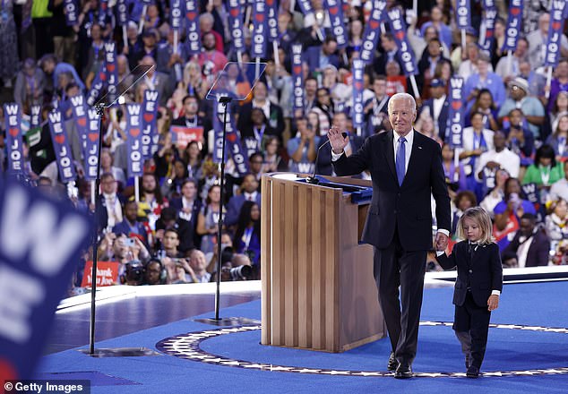 President Joe Biden (left) walks off the stage with his baby Beau (right) after delivering his speech at the Democratic National Convention on Monday night. He is headed to California to spend the rest of the week