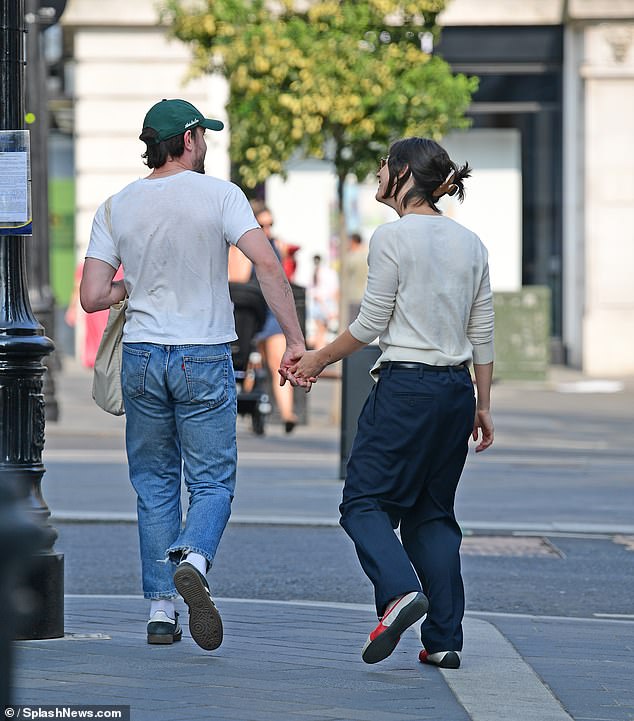 Paul and Gracie made a very loving couple, holding hands and laughing together.