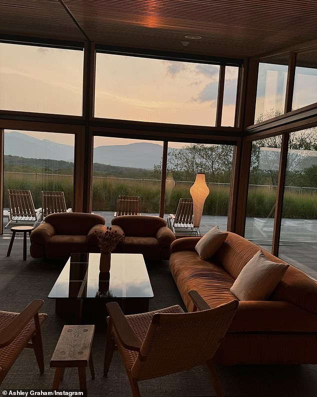 In addition to sweet selfies, fun outings, and good food, Graham also included stunning sunset snaps in her post. One of them was from the view of her luxurious living room with floor-to-ceiling windows.